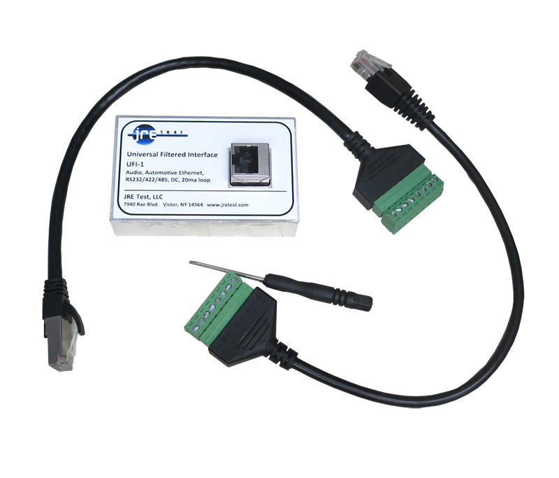 The JRE UFI-1 universal filtered interface module with two breakout cables terminating in green screw-terminal blocks, plus a small screwdriver